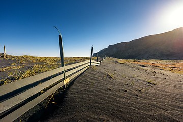 Image showing Deserted shore with black sand