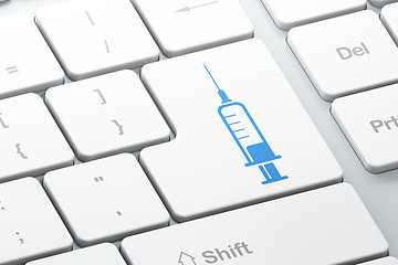 Image showing Health concept: Syringe on computer keyboard background