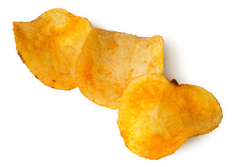 Image showing Three pieces of potato chips in a row