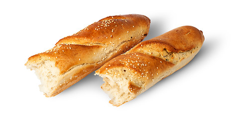 Image showing Two pieces of French baguette beside
