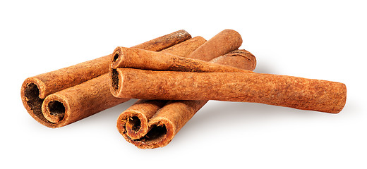 Image showing Three cinnamon sticks lying cross