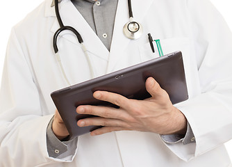 Image showing Doctor using a digital tablet