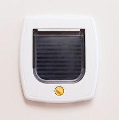 Image showing Inside view of a regular white cat flap