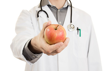 Image showing Nutritionist doctor, giving an apple, isolated