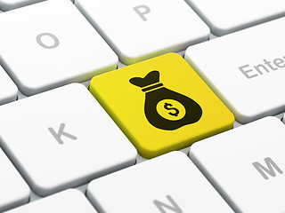 Image showing Finance concept: Money Bag on computer keyboard background