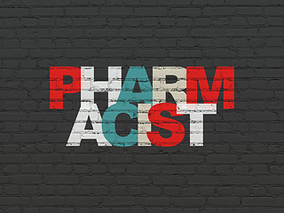 Image showing Health concept: Pharmacist on wall background