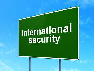 Image showing Privacy concept: International Security on road sign background