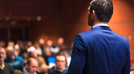 Image showing Public speaker giving talk at Business Event.