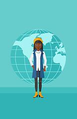 Image showing Business woman standing on globe background.