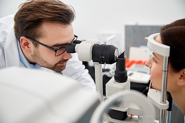 Image showing optician with tonometer and patient at eye clinic