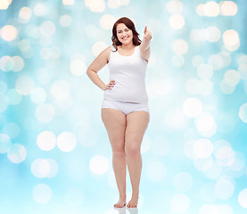 Image showing plus size woman in underwear showing thumbs up