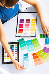 Image showing woman working with color samples for selection