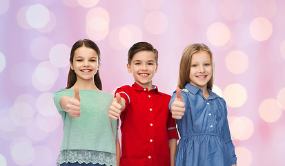 Image showing happy children showing thumbs up