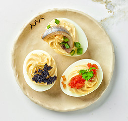 Image showing boiled stuffed decorative eggs