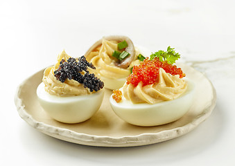 Image showing boiled stuffed decorative eggs