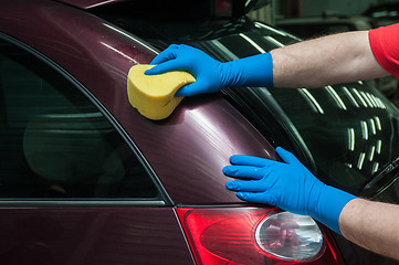 Image showing washing car with sponge