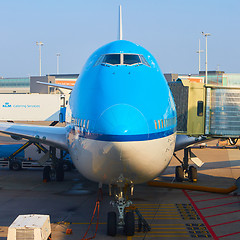 Image showing KLM plane being loaded at Schiphol Airport. Amsterdam, Netherlands