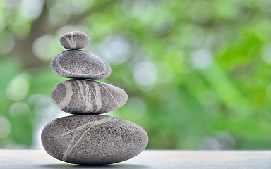 Image showing Stack of four stones isolated