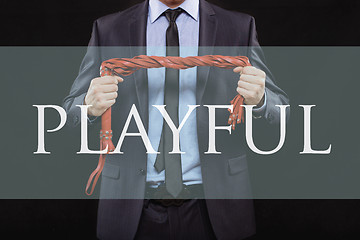 Image showing man in business suit with chained hands. handcuffs for sex games. concept of erotic entertainment. playful