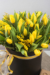 Image showing Bright spring bouquet of tulips and mimosa flowers