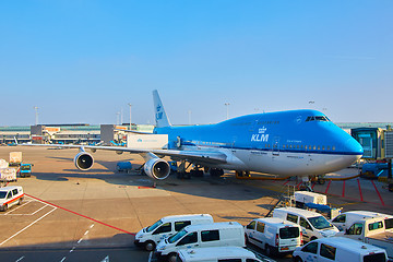 Image showing KLM plane being loaded at Schiphol Airport. Amsterdam, Netherlands