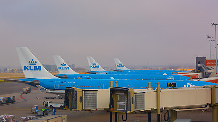 Image showing KLM plane being loaded at Schiphol Airport. Amsterdam, Netherlands