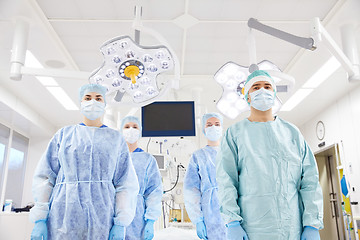 Image showing group of surgeons in operating room at hospital