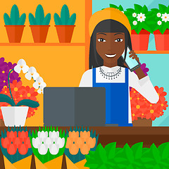 Image showing Florist taking order.