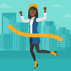 Image showing Business woman crossing finish line.