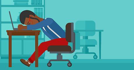 Image showing Man sleeping on workplace.