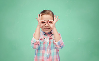 Image showing happy little girl making faces and having fun