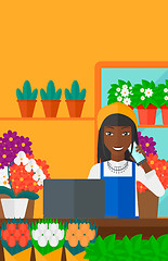 Image showing Florist taking order.