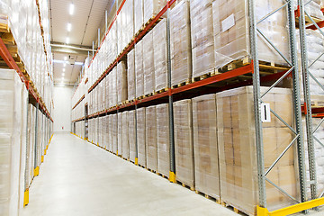 Image showing cargo boxes storing at warehouse shelves