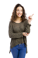 Image showing Happy girl pointing