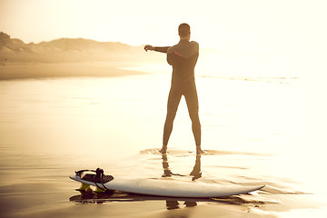 Image showing Warming up for the waves