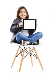 Image showing Young girl using a tablet