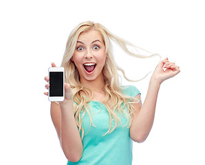 Image showing happy young woman or teenage girl with smartphone