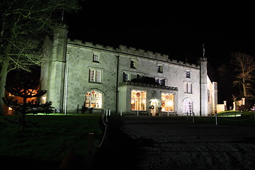 Image showing stately home lit at night