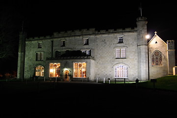 Image showing stately home lit at night