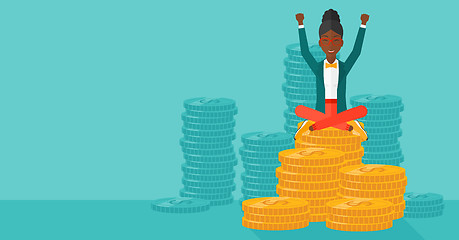 Image showing  Happy business woman sitting on coins.