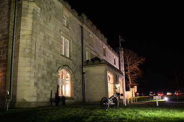 Image showing stately home lit at night