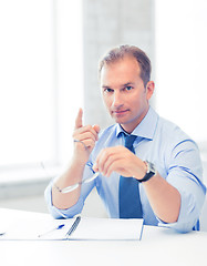 Image showing businessman showing warning gesture