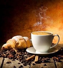 Image showing Fresh croissant and coffee