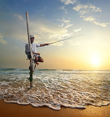 Image showing Fisherman at sunset