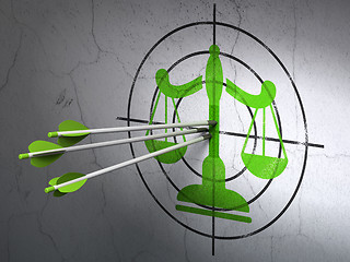 Image showing Law concept: arrows in Scales target on wall background