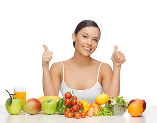 Image showing happy woman with fruits and vegetables