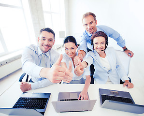 Image showing group of office workers showing thumbs up