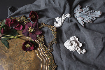 Image showing Ancient copper tray and flowers