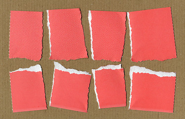 Image showing Red Torn paper pieces