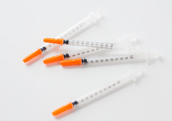 Image showing close up of insulin syringes on table